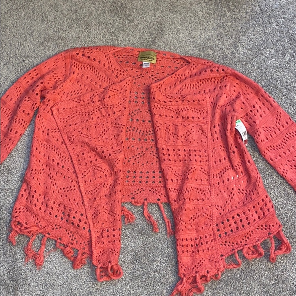 Sweater with tags